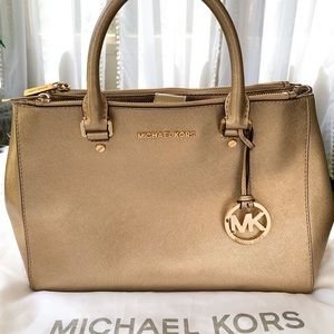 Gold Michael Kors purse